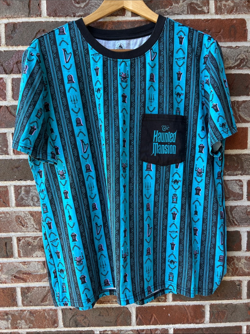 Disney Parks Teal and Black Haunted Mansion Pocket Tee